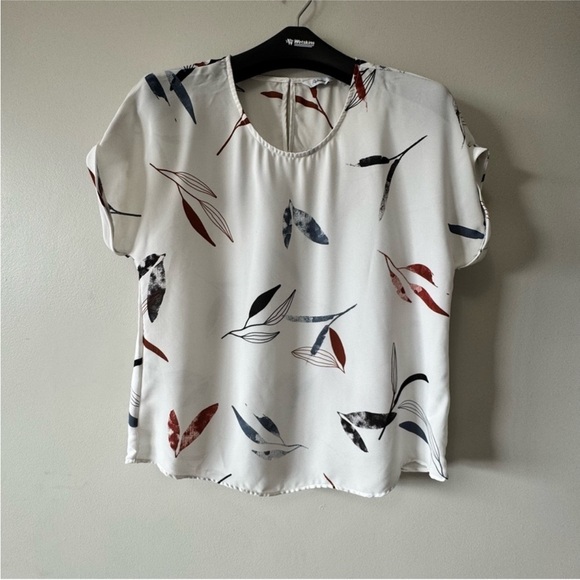 Reitmans Tops - Reitmans White Blouse with Black and Red Leaf Pattern